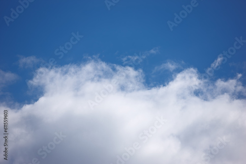Nature  space and atmosphere with clouds in blue sky for heaven  peace and climate. Sunshine  mockup and dream with fluffy cloudscape in ozone air for freedom  pattern and weather meteorology