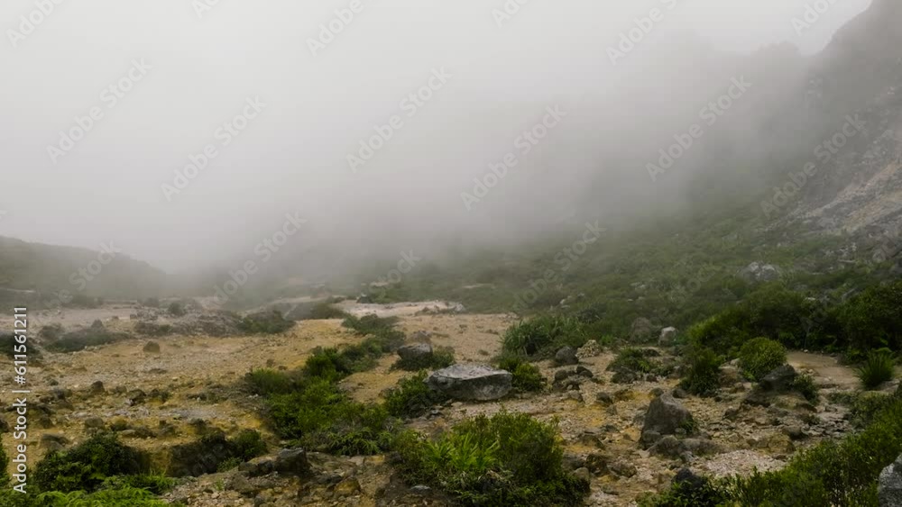 Active volcano Sibayak crater with volcanic gases and clouds. Berastagi. Sumatra. Indonesia. Active volcano Sibayak crater with volcanic gases and clouds. Berastagi. Sumatra. Indonesia.