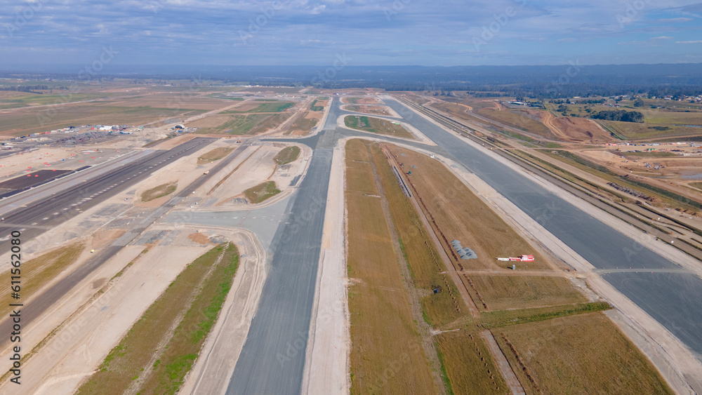 Aerial drone view of the runways at the construction site of the new Western Sydney International Airport at Badgerys Creek in Western Sydney, NSW, Australia in June 2023    