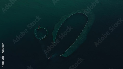 Crew of Fishermen Work on Commercial Fishing Ship that Pulls Trawl Net, Yen island, Phu Yen, Vietnam photo