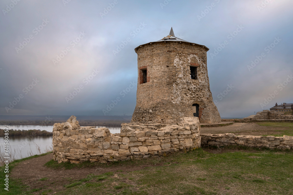 View of the remains of a fortified settlement on the bank of the Kama River - a white stone tower on the Yelabuga (Devil's) settlement on a summer day, Yelabuga, Republic of Tatarstan, Russia