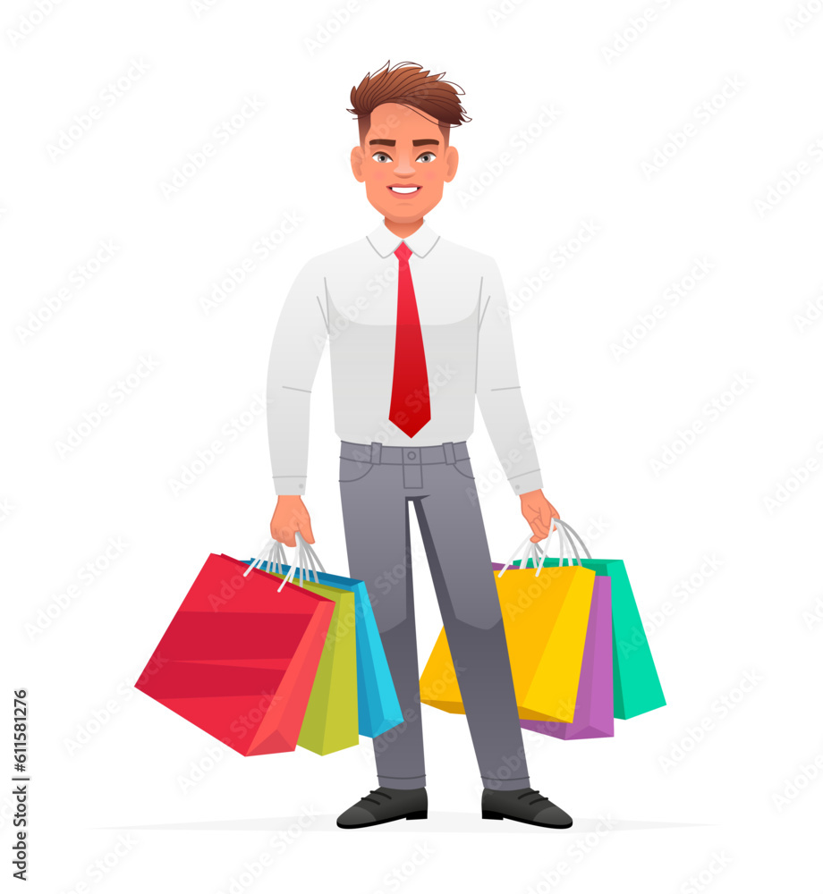 A young businessman stands with multi-colored paper bags from shopping. Happy guy with packages goes shopping. A young businessman stands with multi-colored paper bags from shopping. Happy guy with packages goes shopping.
