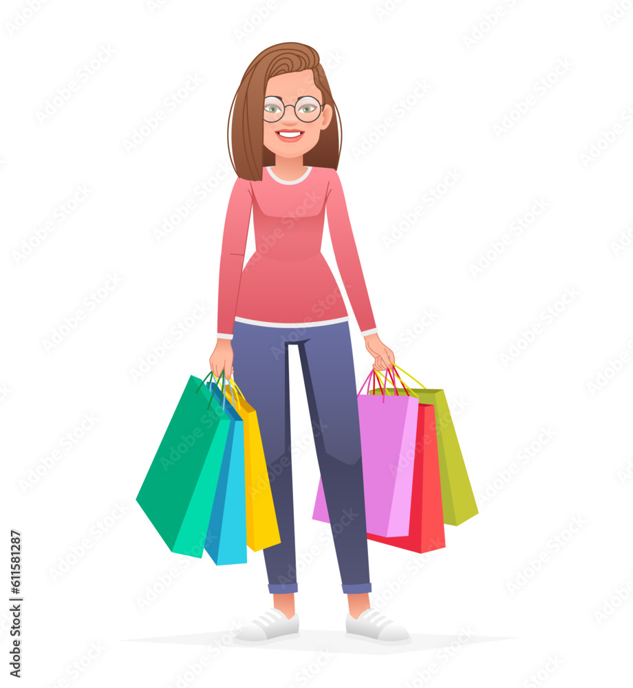 A young beautiful girl stands with multi-colored paper bags from shopping. Happy woman in glasses with packages goes shopping.