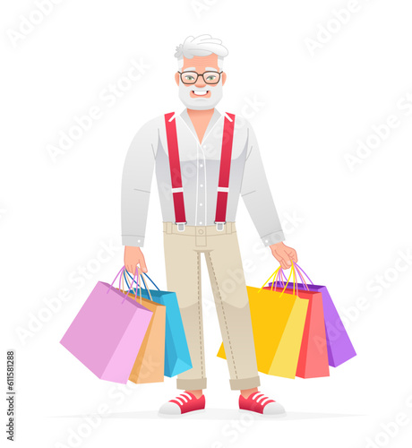 A gray-haired elderly man in glasses stands with multi-colored paper bags from shopping. Happy grandfather with packages goes shopping.