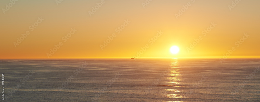 Naklejka premium Orange sky, sunset and sea at morning on the horizon with ocean and waves landscape. Sunrise background, calm weather and summer by beach with coastline and outdoor environment with sun and mockup