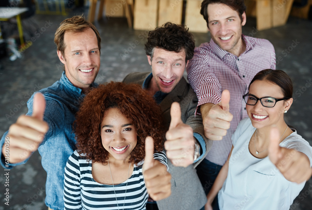 Obraz premium Portrait, thumbs up or happy business people in agreement, support or collaboration together in office. Startup community team, diversity or group of employees with thumb up, yes or like hand gesture