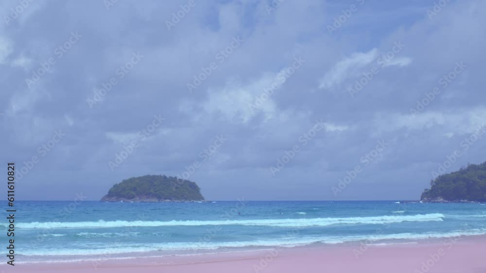 .scenery white cloud in blue sky above the island..beautiful nature on the beach.high waves in the sea.White foam waves dissolve into the sea..smooth waves from green sea background.. .scenery white cloud in blue sky above the island..beautiful nature on the beach.high waves in the sea.White foam waves dissolve into the sea..smooth waves from green sea background..