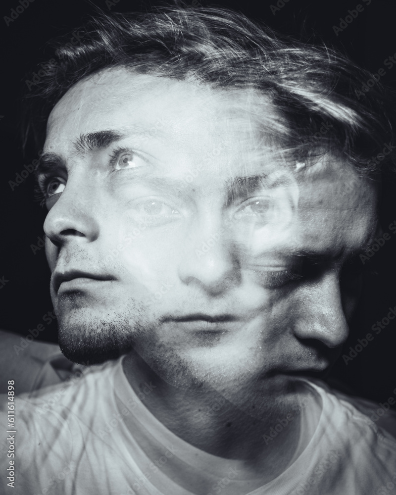 Obraz premium Chaotic thoughts displayed with a double exposure of a man in a dark room.