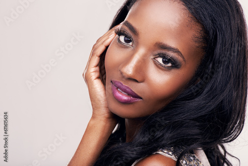 Beauty, makeup and face of a black woman in studio for cosmetics, skincare or hair extension. Portrait of african female model on a white background for mockup, facial skin glow and luxury aesthetic