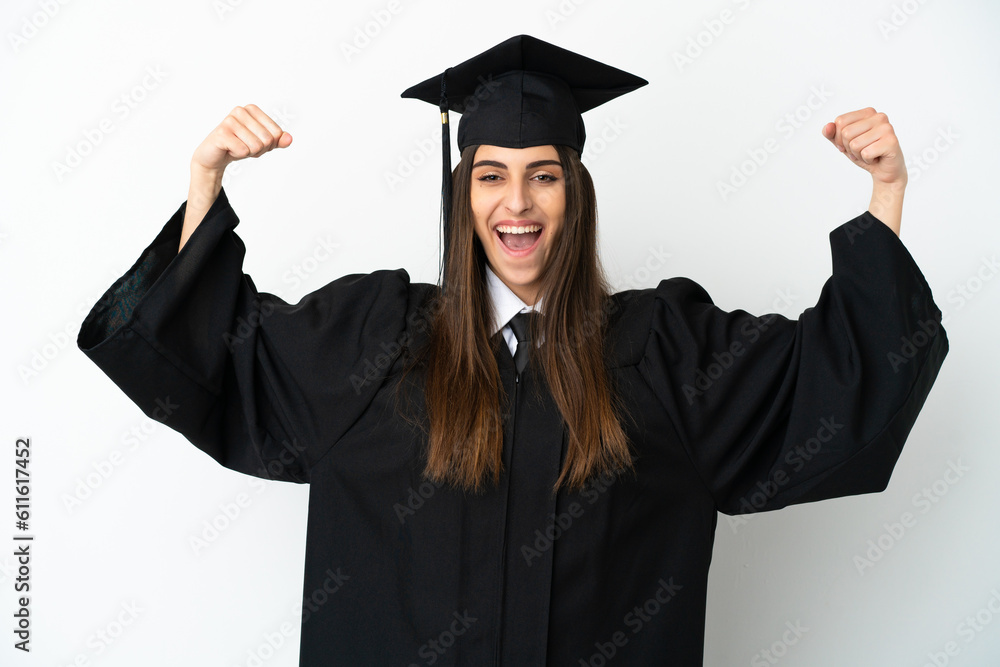 Young university graduate isolated on white background doing strong gesture Young university graduate isolated on white background doing strong gesture