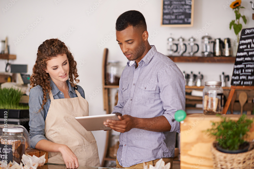 Fototapeta premium Tablet, cafe barista and teamwork of people, discussion and training in coffee shop. Waiters, black man and woman in restaurant with technology for inventory, stock check or managing sales in store.