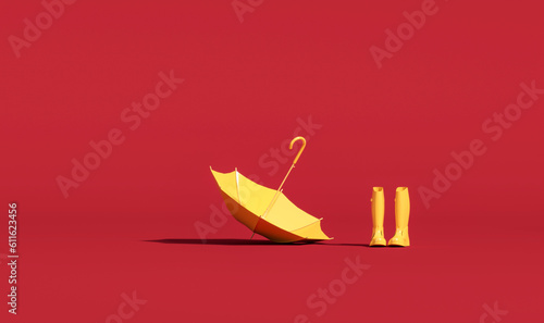 Red umbrella with rubber boots for rain and umbrella over yellow background