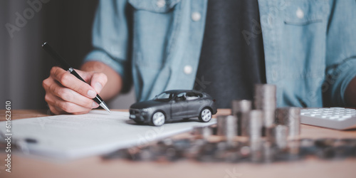 Customers sign insurance documents or car rental forms ,Providing financial services and car insurance ,financial car loans ,car purchase agreement ,Approval of hire-purchase agreements
