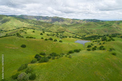 Upper Cottonwood Creek Wildlife Area. Beautiful Nature and Landscape. Green area with Cloudy Sky. Close to San Luis Reservoir. California, USA. Drone