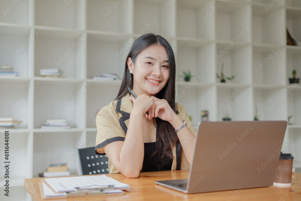 Successful Businesswoman enjoying with strategy and planning business. Working with positive emotion. Successful Businesswoman enjoying with strategy and planning business. Working with positive emotion.