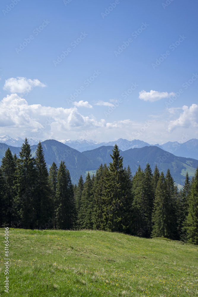 Scenic view in the mountains with blue sky and clouds
