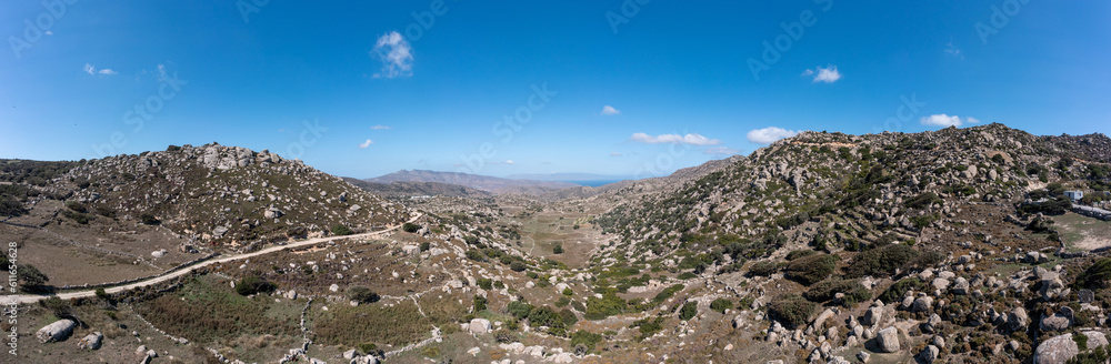 Panoramic view of huge rock, plateau, valley, Volax Tinos island Cyclades Greece. Banner
