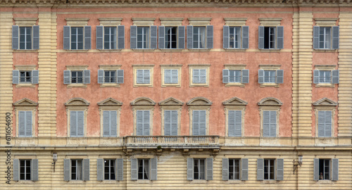 A colorful facade of an old building in Siena, Renaissance architecture 