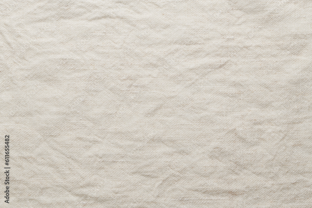 Fototapeta premium Linen crumpled texture natural fabric background closeup