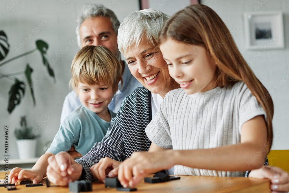 grandchild family child grandparent grandfather grandmother game playing domino granddaughter grandson leisure entertainment fun hobby grandchild family child grandparent grandfather grandmother game playing domino granddaughter grandson leisure entertainment fun hobby