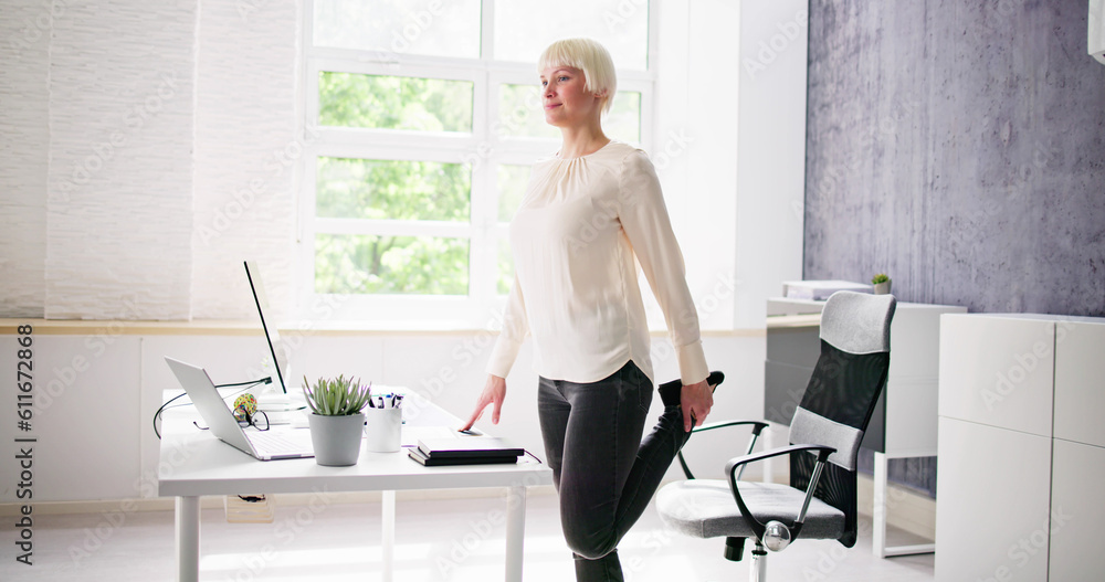 Yoga Workout In Office Behind Business Computer Yoga Workout In Office Behind Business Computer