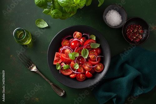 healthy tomato salad with onion basil olive oil and balsamic vinegar