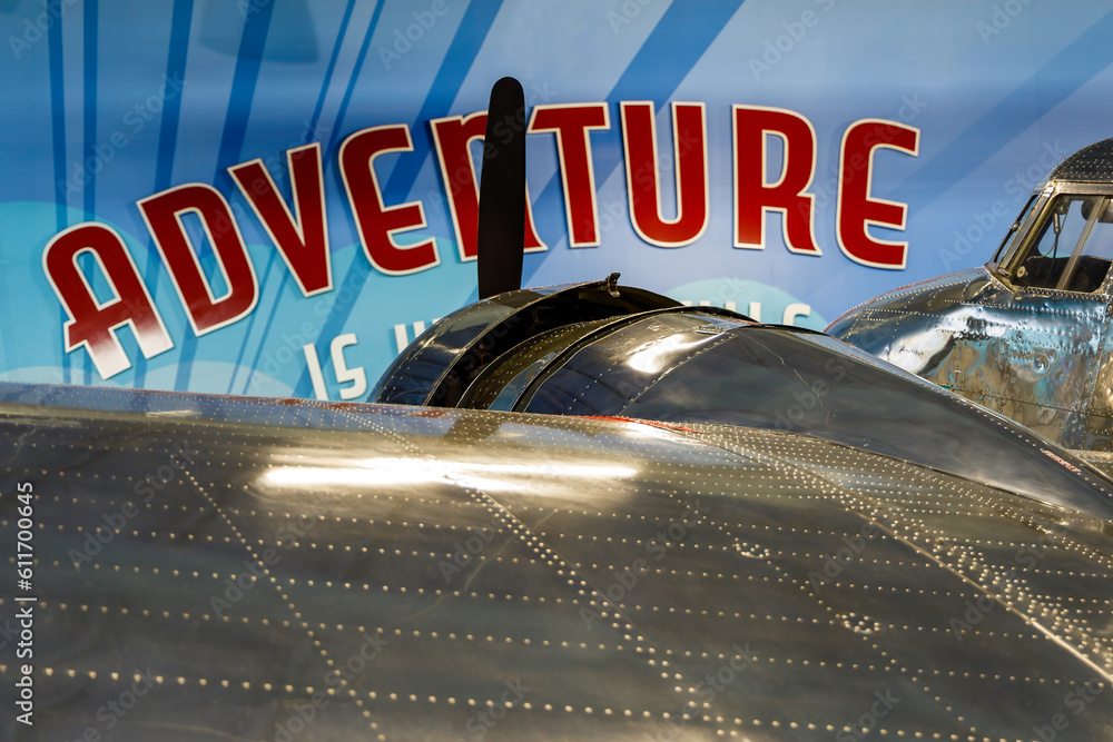 Ταπετσαρία Left wing, engine, and cockpit of Electra passenger aircraft with adventure sign