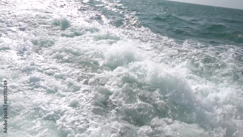 Water moving in a wild river with rocks in real time. Ocean fast motion, Sea storm with turquoise waves Aerial landscape, Ecology and clean water, Nature Concept. Water moving in a wild river with rocks in real time. Ocean fast motion, Sea storm with turquoise waves Aerial landscape, Ecology and clean water, Nature Concept.