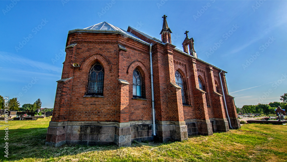 General view and close-up of architectural details of a cemetery chapel built in the second half of the 19th century in Czerwin, Mazovia, Poland. General view and close-up of architectural details of a cemetery chapel built in the second half of the 19th century in Czerwin, Mazovia, Poland.