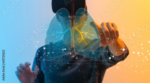 Healthcare and medicine, Covid-19, Doctor holding and diagnose virtual Human Lungs with coronavirus spread inside on modern interface screen on hospital background, Innovation and Medical technology.