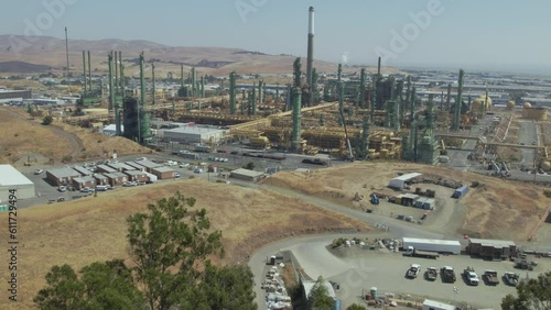 Large towers and pumps adorn the Benicia Oil Refinery in California photo