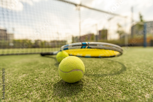 Tennis racket and balls, flat lay. Space for text