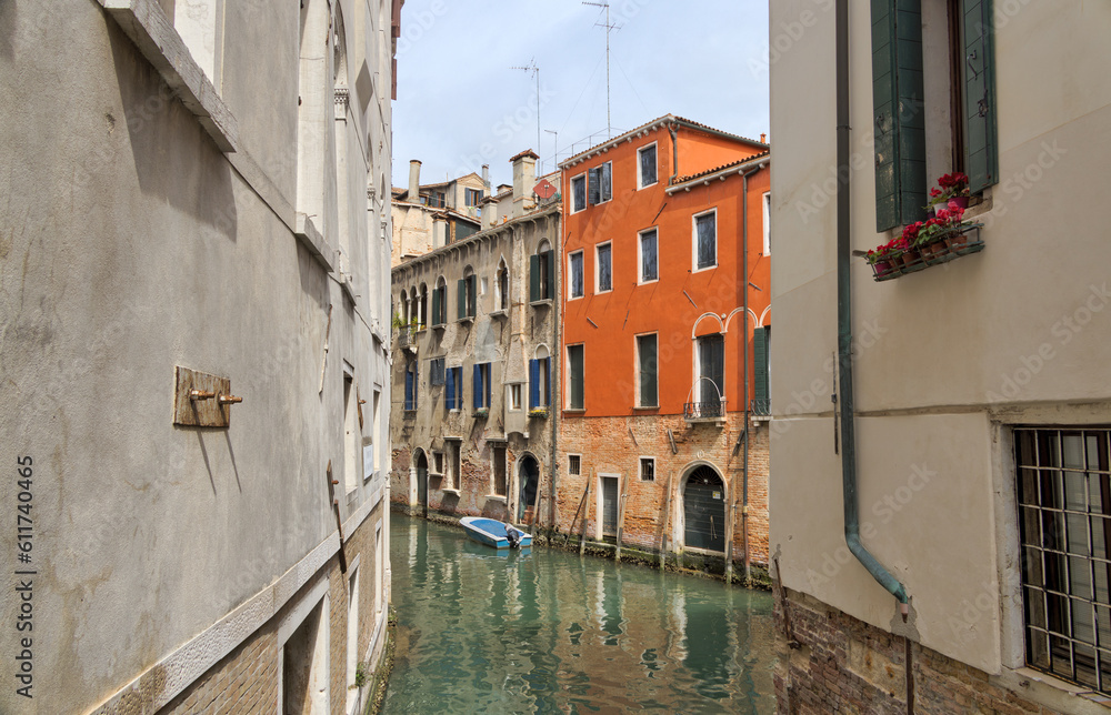 Intimate Canal View Amidst Venice's Residential Walls