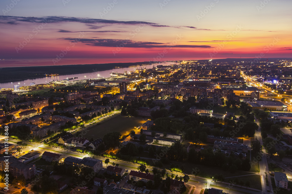 Scenic aerial view of the Old town of Klaipeda, Lithuania in purple evening light. Klaipeda city port area and it's surroundings.