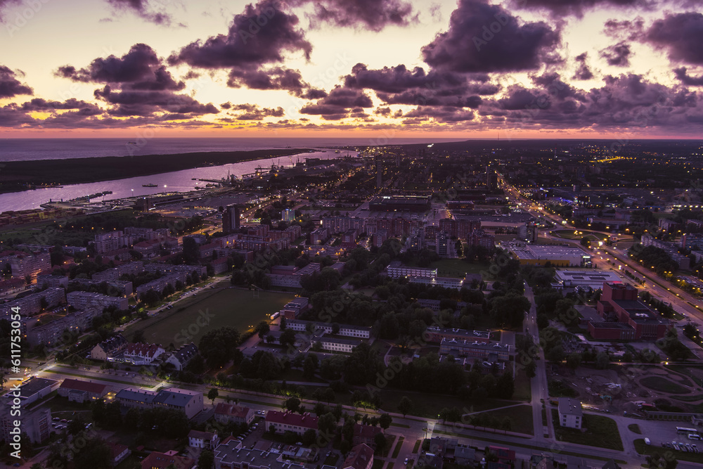 Scenic aerial view of the Old town of Klaipeda, Lithuania in evening light. Klaipeda city port area and it's surroundings on summer night.