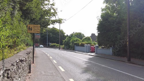 Road in Ireland with traffic sign Caution children crossing