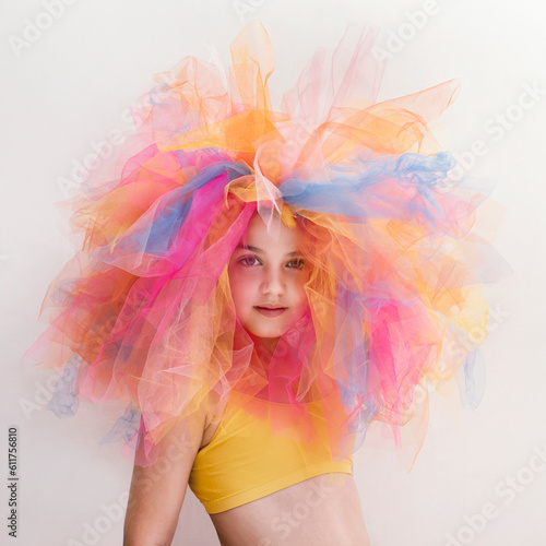 Bimba con parrucca colorata photo