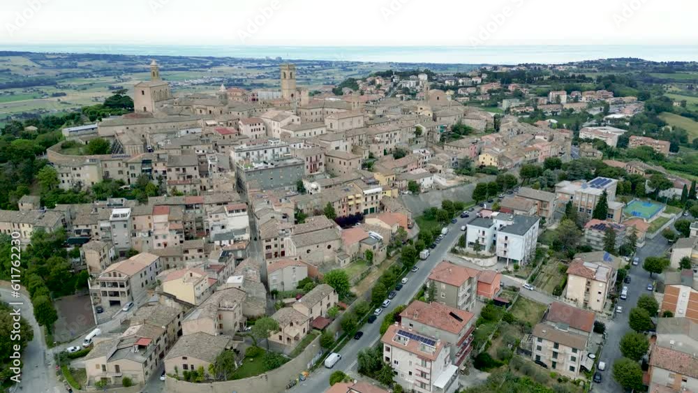 italy, june 2023 - aerial view of the medieval village of Potenza Picena in the province of Macerata in the Marche region. From the town you can see Mount Conero and the Adriatic Sea in the background italy, june 2023 - aerial view of the medieval village of Potenza Picena in the province of Macerata in the Marche region. From the town you can see Mount Conero and the Adriatic Sea in the background