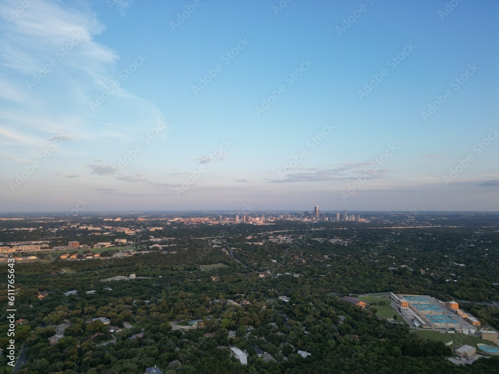 Aerial view of Lake Austin, via Mount Bonnell, with downtown's skyline to the left and the Pennybacker Bridge to the right. 