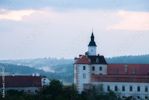 Jevišovice castle viewed from the forest. European castle in countryside landscape