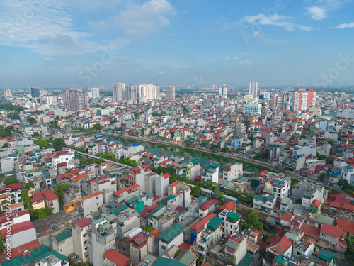 Aerial view of residential neighborhood roofs. Urban housing development from above. Top view. Real estate in Hanoi City, Vietnam. Property real estate.