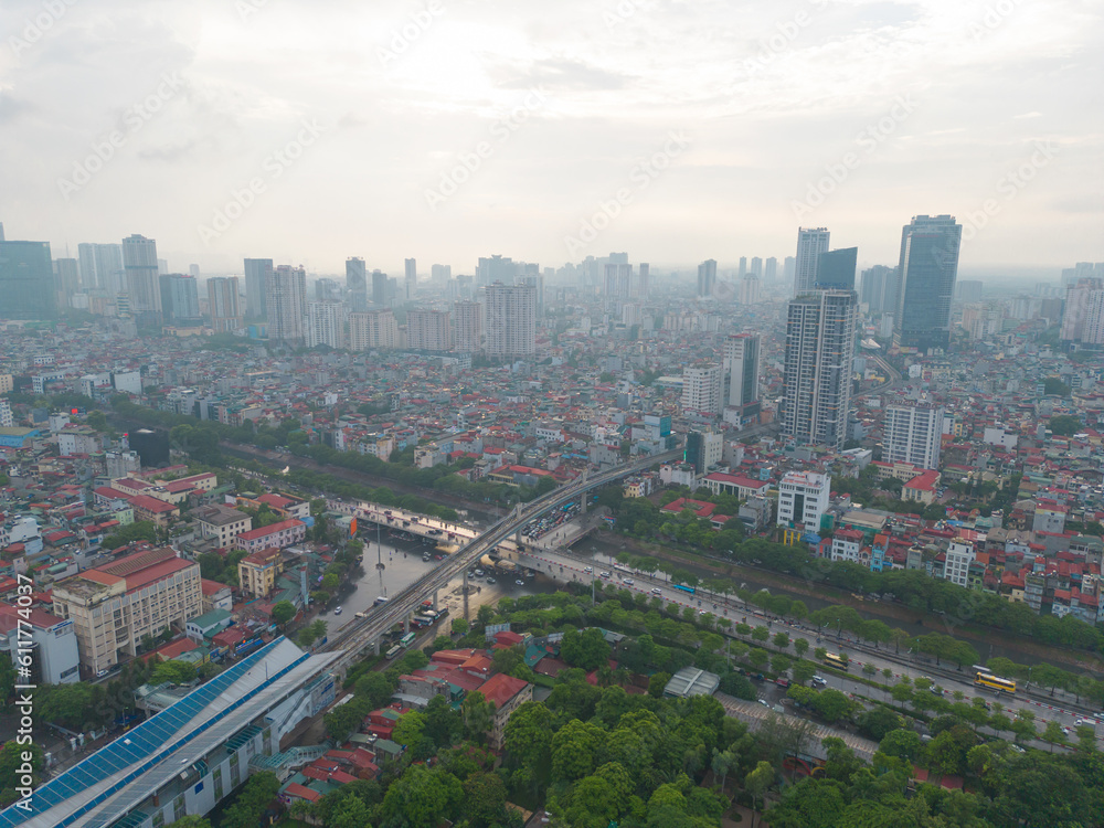 Aerial view of Hanoi Downtown Skyline with green garden park, Vietnam. Financial district and business centers in smart urban city in Asia. Skyscraper and high-rise buildings.