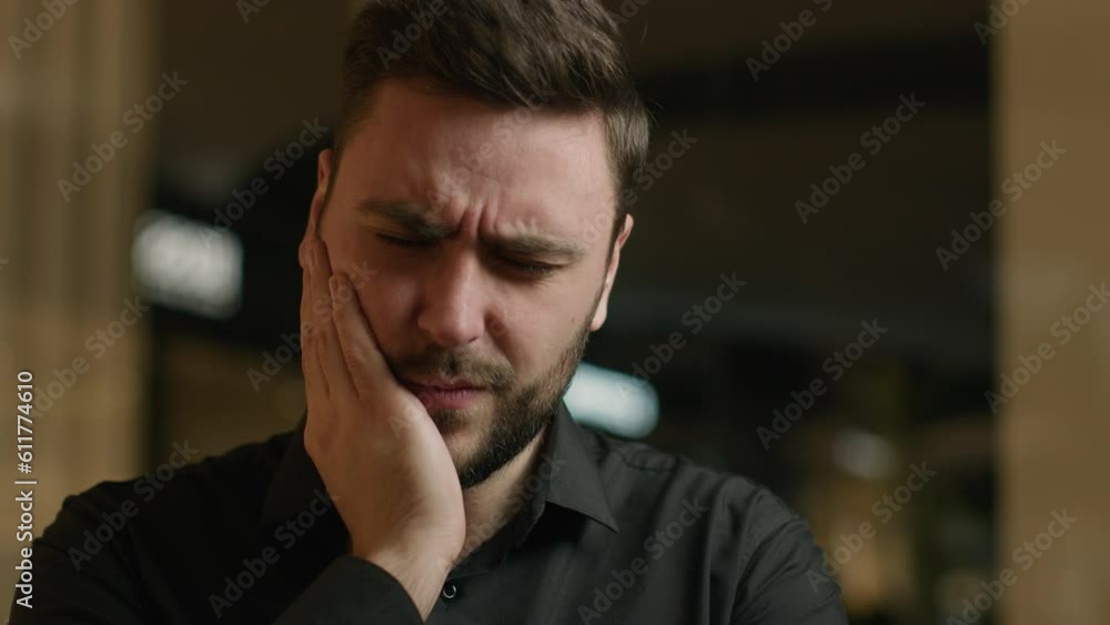 Sick man Caucasian guy touch painful cheek feel dental pain toothache teeth caries tooth