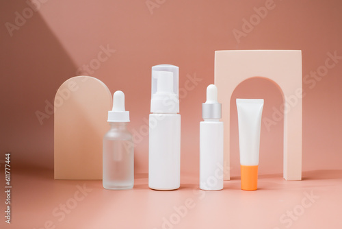 beauty product for summer. mock-up skincare container with sunscreen on a pastel display background.