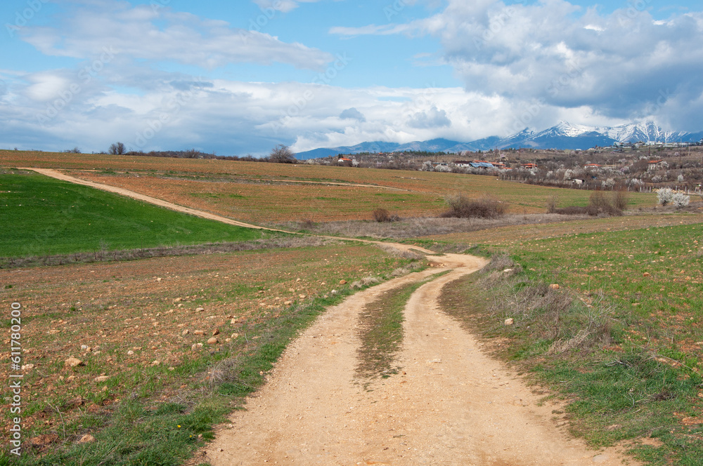 Country landscape, dirt road, early springtime