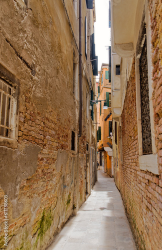 Fototapeta Naklejka Na Ścianę i Meble -  Time-Worn Brick Alleys of Venice