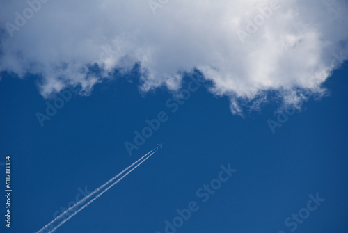 Aircraft flying in the clouds.Airplane and beautiful blue sky and cloud.