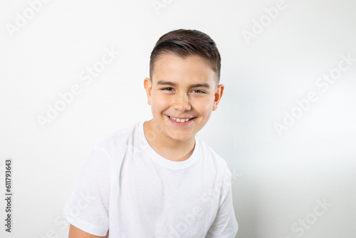 smiling 8 years old boy with brown eyes