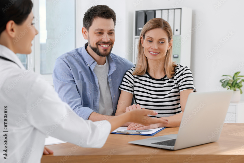 Couple having appointment with fertility doctor in clinic. Patient consultation Couple having appointment with fertility doctor in clinic. Patient consultation