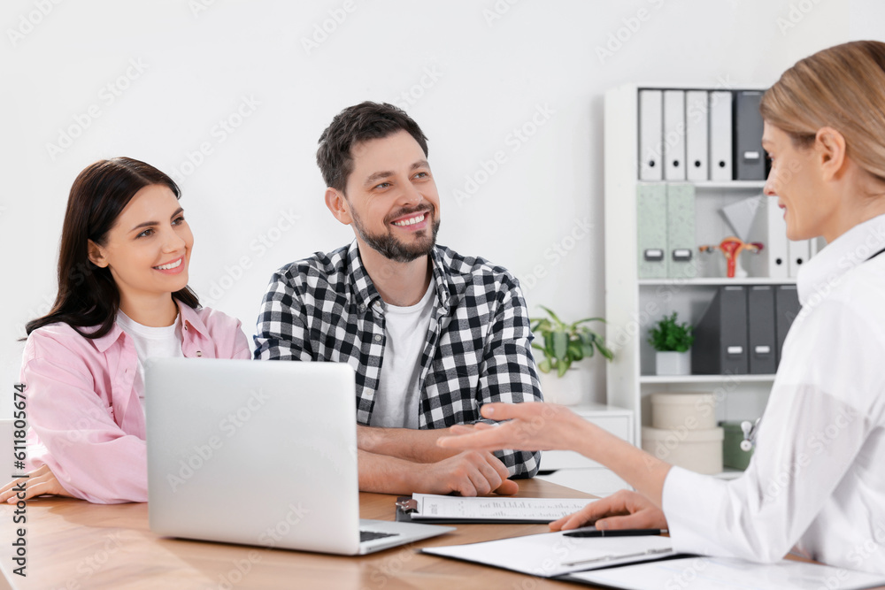 Couple having appointment with fertility doctor in clinic. Patient consultation Couple having appointment with fertility doctor in clinic. Patient consultation